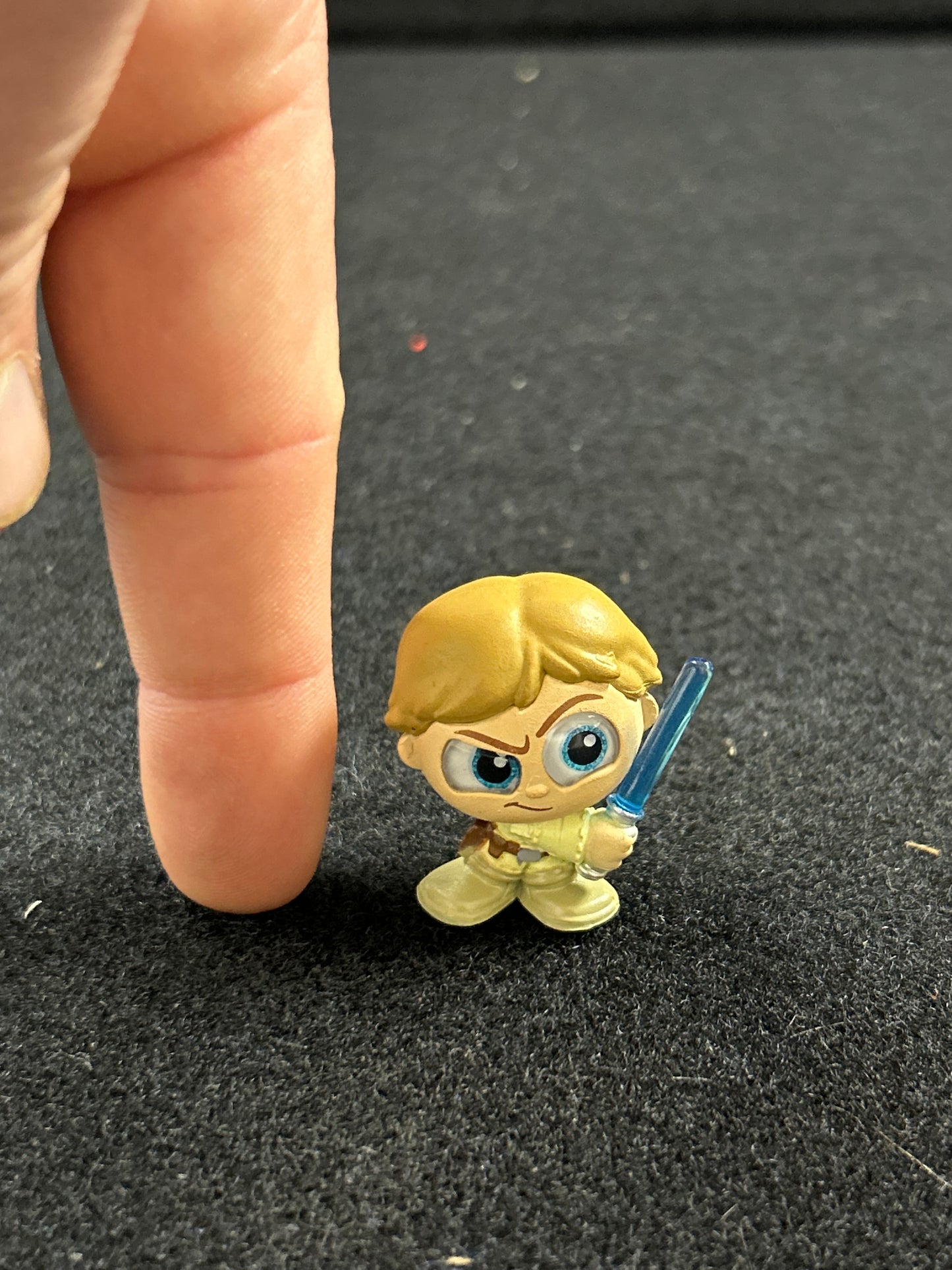 Mini figure with blue lightsaber