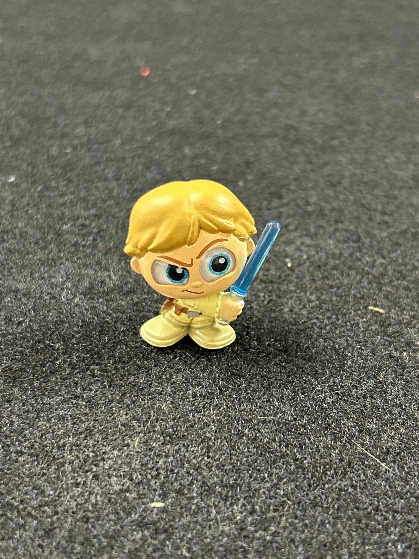 Mini figure with blue lightsaber